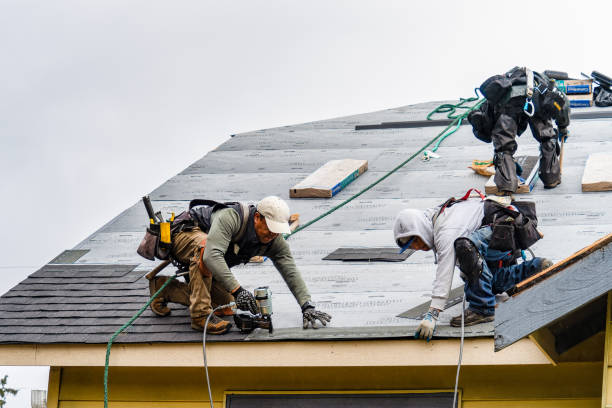 Professional Roof Replacement technician working in Interlaken, CA